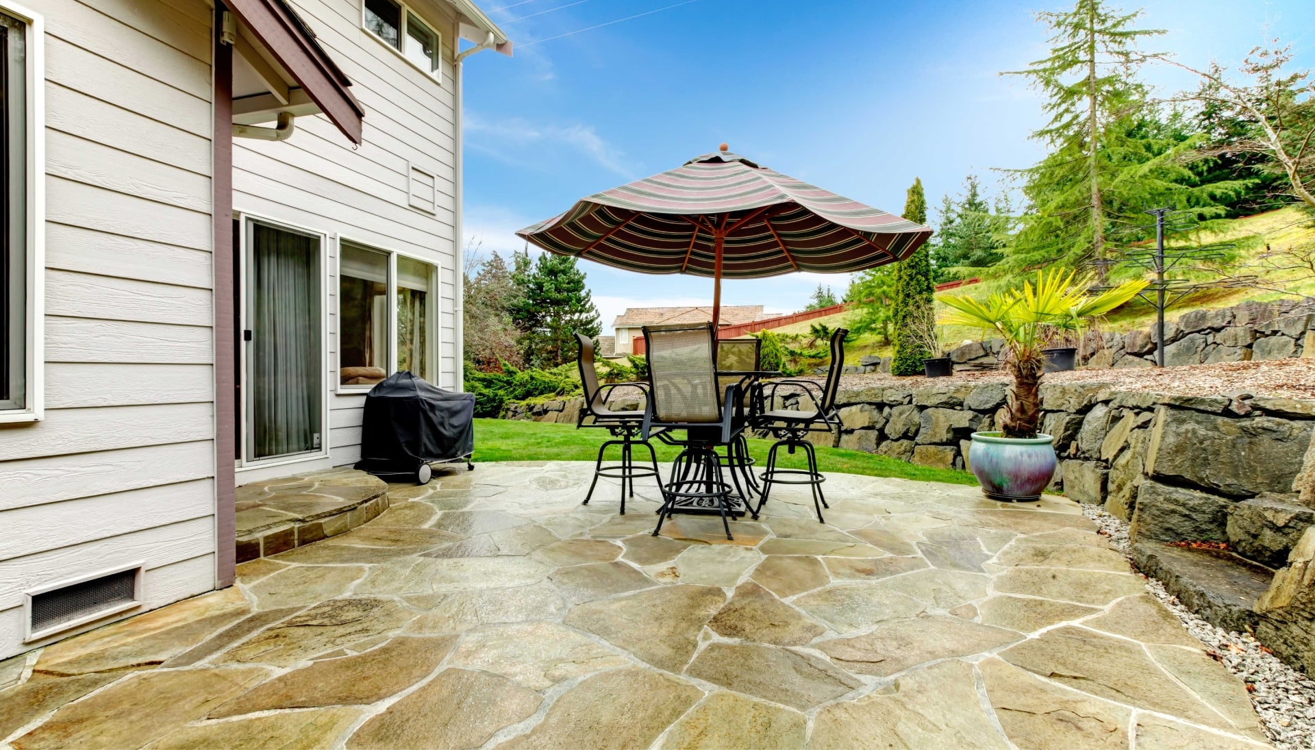Create an Outdoor Oasis with Stunning Concrete Patio in Detroit, MI - Enjoy Beautifully Textured and Patterned Concrete Surfaces for Your Entertaining and Relaxation Needs.