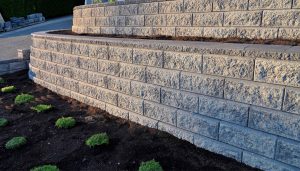 Strengthen Your Landscape and Prevent Erosion with Durable Concrete Retaining Walls in Seattle, WA - Choose from Various Styles, Colors, and Finishes to Achieve a Custom and Functional Concrete Wall System that is Long-Lasting, Low-Maintenance, and Complements Your Property.