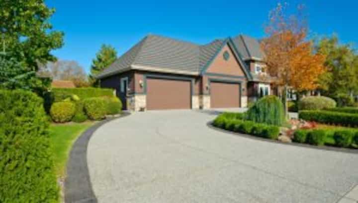 Upgrade Your Curb Appeal with Beautiful Paved Concrete Driveway in Detroit, MI - Enhance Your Property Value and Convenience with a Durable and Smooth Surface for Your Vehicles with a Wide Range of Customizable Options to Choose From.